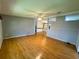 Spacious living room featuring wood floors and lots of open space at 106 Pyracantha Ln, Leesburg, FL 34748