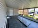 Inviting screened porch provides ample space and leads to a convenient side entry door at 106 Pyracantha Ln, Leesburg, FL 34748