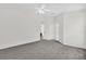Spacious bedroom with neutral walls, carpet flooring, and ample natural light at 11172 Pinewood Cove Ln, Orlando, FL 32817