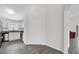 Modern kitchen featuring stainless steel appliances, granite countertops, and ample cabinet space at 11172 Pinewood Cove Ln, Orlando, FL 32817