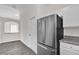 Bright kitchen features stainless steel appliances, granite countertops, and ample cabinet space at 11172 Pinewood Cove Ln, Orlando, FL 32817
