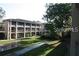 Multi-story building with well-maintained landscaping and exterior walkways at 125 Water Front Way # 200, Altamonte Springs, FL 32701