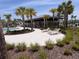 Inviting community pool with a shaded cabana area and poolside seating at 1258 Wispy Cypress Drive Dr, Kissimmee, FL 34746