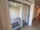 Enclosed patio features tile flooring, fan and curtains for privacy at 1258 Wispy Cypress Drive Dr, Kissimmee, FL 34746