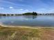Scenic pond with homes on the opposite shore at 1258 Wispy Cypress Drive Dr, Kissimmee, FL 34746