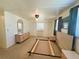 Bedroom features ample closet space, with natural light creating an airy atmosphere at 129 Dogwood Trl, Leesburg, FL 34748
