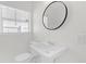 Modern bathroom features natural light, new sink and fixtures at 1600 Hart Ln, Orlando, FL 32804