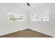 Sunlit bedroom boasts two windows offering bright, natural light at 1600 Hart Ln, Orlando, FL 32804