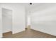 Clean bedroom features wood-look floors and walk-in closet at 1600 Hart Ln, Orlando, FL 32804