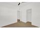 Bright bedroom features hardwood-style floors and closet space at 1600 Hart Ln, Orlando, FL 32804