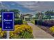 Sunset Park sign with a path leading to a gazebo overlooking the lake at 1810 Centennial Ave, St Cloud, FL 34769
