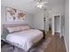 This bedroom features a queen-sized bed and ensuite bathroom with walk-in closet at 1833 Courtland St, Orlando, FL 32804