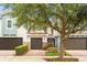 Charming townhouse featuring a brick driveway, attached garage, and well-maintained landscaping at 1880 Garden Sage Dr, Oviedo, FL 32765