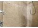 Close up of tiled shower featuring a decorative tile border at 1880 Garden Sage Dr, Oviedo, FL 32765