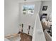 Upper view of the foyer with ample natural light, stylish decor, and a welcoming entrance at 1940 Bell Creek Loop, Fruitland Park, FL 34731