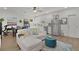 Bright and open living room and kitchen area with modern appliances at 1940 Bell Creek Loop, Fruitland Park, FL 34731