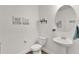 Bright powder room with modern fixtures and decor at 1940 Bell Creek Loop, Fruitland Park, FL 34731