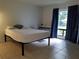 Bedroom with a bed, desk, and tile floors at 2408 Lemon Tree Ln # C, Orlando, FL 32839