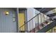 A welcoming entrance door of a unit with stairs leading to the upper floors at 2408 Lemon Tree Ln # C, Orlando, FL 32839