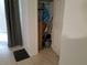 Storage closet with cleaning supplies, including a mop, bucket, and broom at 2408 Lemon Tree Ln # C, Orlando, FL 32839