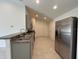 Modern kitchen equipped with stainless steel appliances and plenty of counter space at 280 Harper Estates Cir, Lake Wales, FL 33859