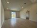 Bright living room featuring tile flooring, recessed lighting, and sliding glass doors at 280 Harper Estates Cir, Lake Wales, FL 33859