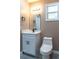 Modern bathroom vanity with contemporary fixtures and a toilet at 3426 Somerset Ave, Deltona, FL 32738