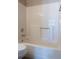 Bathroom with tub and shower combination with white acrylic surround at 3426 Somerset Ave, Deltona, FL 32738