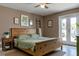 Bedroom with hardwood furnishings, leafy green accents, and bright natural light at 3426 Somerset Ave, Deltona, FL 32738