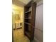 Bathroom featuring shelves and a vanity at 3475 Flossmoor Ave # 103, Orlando, FL 32822