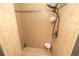 The shower has beautiful tile and a handheld shower head at 39342 Harbor Hills Blvd, Lady Lake, FL 32159