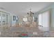 Open-concept space featuring a dining area flowing into a comfortable living room at 424 Valverda Dr, The Villages, FL 32162