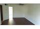 Bright living room with dark flooring and ceiling fan provides ample space and comfort at 4302 Aqua Vista Dr # G, Orlando, FL 32839