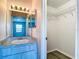 Ensuite bathroom featuring a modern vanity, granite counters, and large mirror at 4680 Sw 142 Place Rd, Ocala, FL 34473