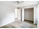 Bedroom features closet, vinyl floors and a ceiling fan at 4680 Sw 142 Place Rd, Ocala, FL 34473