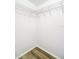 Walk-in closet features wire shelving for ample storage at 4680 Sw 142 Place Rd, Ocala, FL 34473