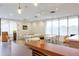 Bright dining area with sleek tables, chairs, and large windows for natural light at 5245 W Irlo Bronson Memorial Hwy # 113, Kissimmee, FL 34746