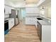 Renovated kitchen featuring granite counters, stainless appliances and ample cabinet space at 5704 Sw 108Th St, Ocala, FL 34476
