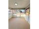 Screened patio offering views of the expansive backyard at 5704 Sw 108Th St, Ocala, FL 34476