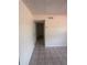 Hallway with tile flooring and neutral walls at 6124 Fox Hunt Trl, Orlando, FL 32808