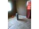 Bedroom with window and neutral walls at 7406 Nolton Way, Orlando, FL 32822