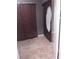 Bedroom featuring tile floors and curtains at 7406 Nolton Way, Orlando, FL 32822