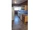 Kitchen features tile flooring, a window over the sink, and white appliances at 7406 Nolton Way, Orlando, FL 32822
