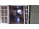 A view of the kitchen featuring tile floors, appliances, and dining area at 7406 Nolton Way, Orlando, FL 32822