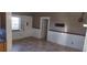 Room with tile flooring, a window, and paneling at 7406 Nolton Way, Orlando, FL 32822