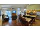 Bright and open living space with a view of the kitchen, dining area, and cozy lounge area at 8457 Secret Key Cove, Kissimmee, FL 34747
