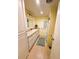 Bright bathroom featuring a white vanity with lots of drawer space and tile floors at 102 Tangelo Cv, Leesburg, FL 34748