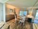 The dining room is well-lit and flows nicely into the living areas at 102 Tangelo Cv, Leesburg, FL 34748