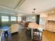 The kitchen flows into an open-concept great room, perfect for entertaining at 102 Tangelo Cv, Leesburg, FL 34748