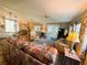 The open-concept living area is ideal for relaxing or entertaining guests at 102 Tangelo Cv, Leesburg, FL 34748
